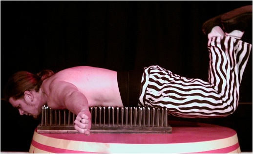 Cabaret Performer with Bed of Nails by Glenn Scott of Lancashire