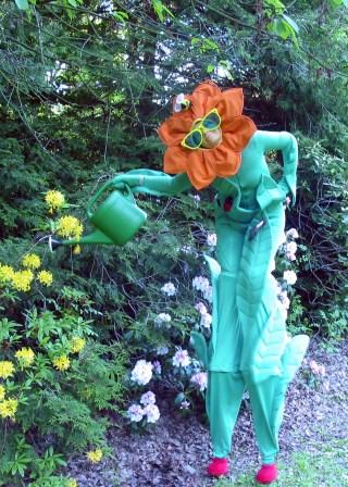 Stilt Walking Flower by Upshot Circus